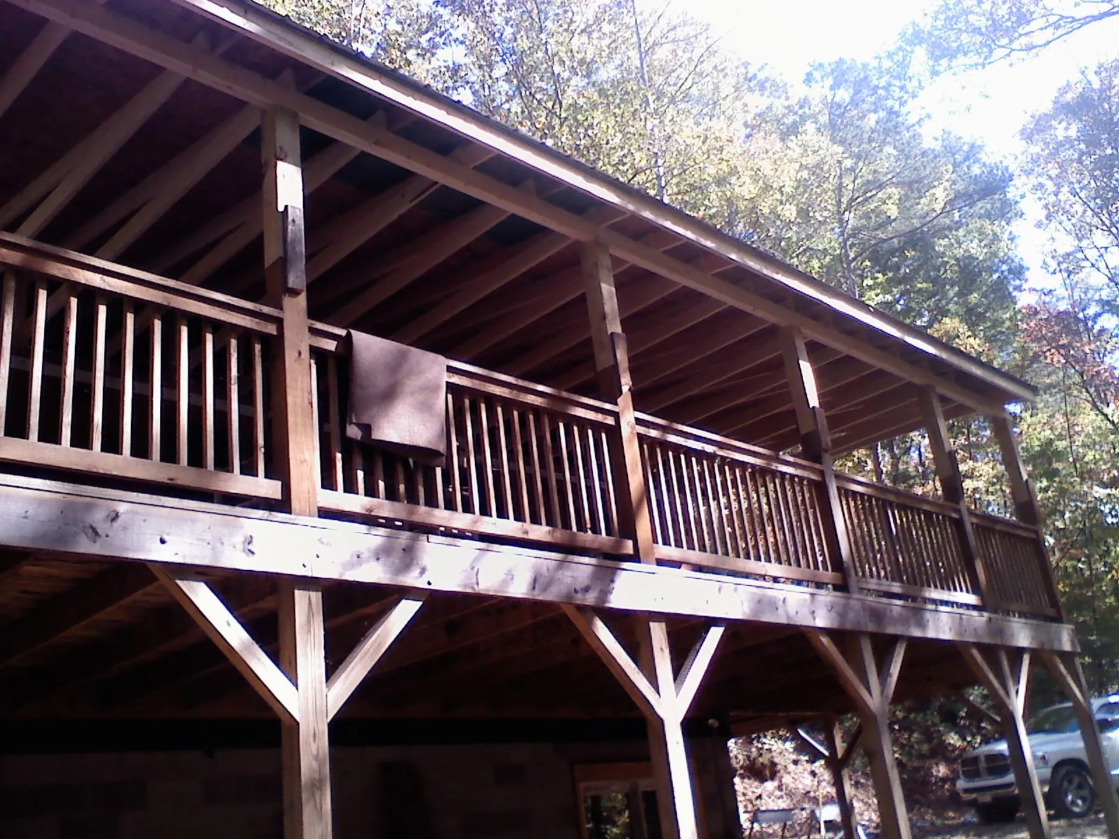 Timber framing under a new elevated porch and deck — Roof Leak Repair in Cove City by Roofing Brothers